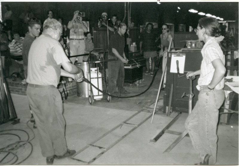 1997 GlassWeekend Guest Artist Lino Tagliapietra pulling cane with his team