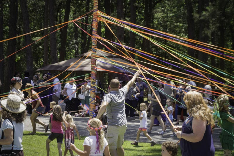 2015 Fantasy Faire participants dancing around the maypole