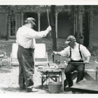 1992 Volunteer Glassblowers, Jeff Vanaman and Harry Deemer, demonstrating outside the Museum of American Glass