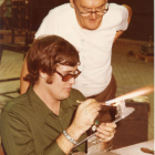 1975 Paperweight Weekend demonstration by Eugene Crabtree and Bob Banford (seated)