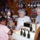 1993 School Tour in the General Store  with Rose Mary Boyle and Charlotte Hoover (L to R)