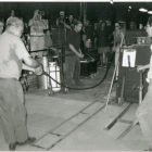 1997 GlassWeekend Guest Artist Lino Tagliapietra pulling cane with his team