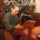 1997 Kathy DeAngelo tuning David Field's Celtic Harp for a performance in the DJFC