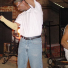 2003 GlassWeekend Demonstrating Artists Richard Jolley (left) and Dante Marioni (seated on right)