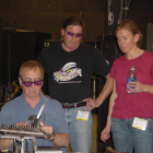 2006 Paperweight Weekend Rick Ayotte (seated) Loren Stump and Melissa Ayotte