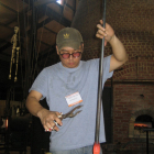 2010 Resident Artist Hyunsung Cho making a glass pumpkin