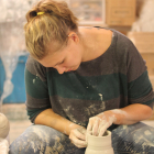 2014 Lauren Wymbs demonstrating in the Pottery during the Festival of Fine Craft