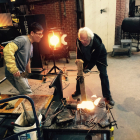 2015 Resident Artist Hyunsung Cho working with Donald Lipski in the Glass Studio