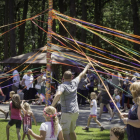 2015 Fantasy Faire participants dancing around the maypole