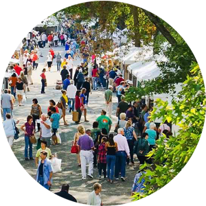 cropped circle aerial shot of the crowd during the festival of fine craft