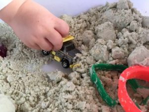 Toy truck in sand