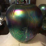 Iridescent vase with a botanical motif by Joe Mattson