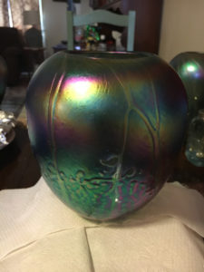 Iridescent vase with a botanical motif by Joe Mattson