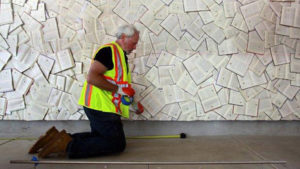 Donald Lipski in front of his large scale public work