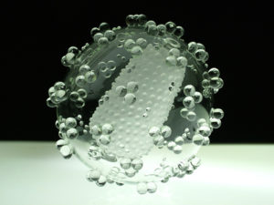 Representation of HIV in a glass piece