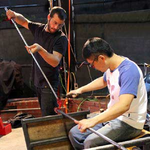 WheatonArts Resident Artists working on glass pieces