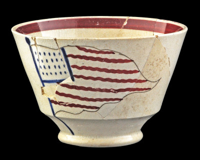 Whiteware teacup decorated with a hand-painted American flag with 24 stars, 1828–1840. Photograph courtesy of AECOM and PennDOT.