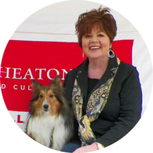 cropped circle image of a Woman and her collie