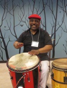 Nelson Baez tapping on drum