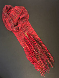Bright red scarf by Pauletta Berger