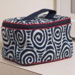 Indigo blue and bright white lunch bag with a blue handle, created by Shengzhu Bernardin