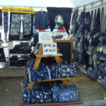 Booth showcasing the indigo fiber art of Shengzhu Bernardin
