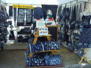 Booth showcasing the indigo fiber art of Shengzhu Bernardin