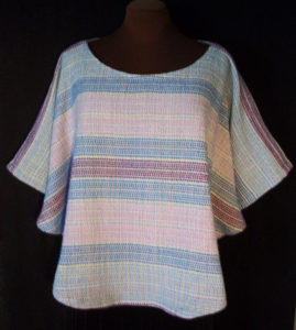 Pastel striped shirt with flowing sleeves by Phillip Breden Jr