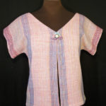 Pastel pink shirt with vertical purple stripes, created by Phillip Breden Jr