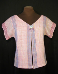 Pastel pink shirt with vertical purple stripes, created by Phillip Breden Jr