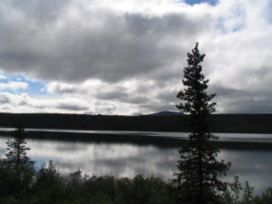 overcast skies over a river