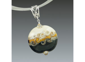 Black and gold pendant by Elizabeth Mitchell