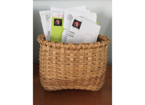 Basket containing mail by Margaret Moran