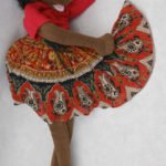 Cloth doll by Jacquelyn Morgan depicting a dancing girl with a flowing patterned dress