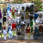 Booth showcasing the cloth puppets and dolls of Jacquelyn Morgan