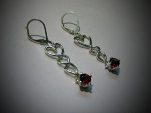 Silver earrings with red stone by Anthony Niglio