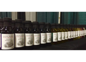 Various bottles of balsamic vinaigrette by Paul Scott