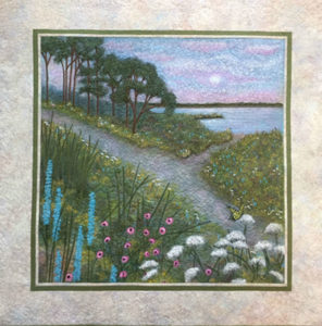 An acrylic painting on cotton depicting a peaceful nature trail neighboring a lake with lush trees and flowers with a yellow butterfly surrounded by a white frame