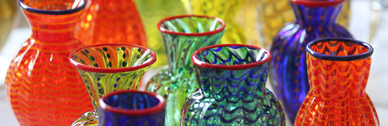 Green, yellow, and blue blown glass vases with colored rims for the Holiday Studio Sale