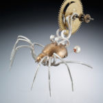 Spider shaped from silver and gold painted found objects by Ricky Boscarino