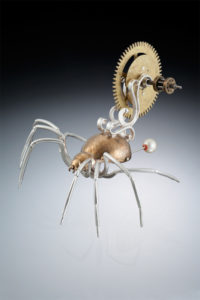 Spider shaped from silver and gold painted found objects by Ricky Boscarino