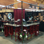 Booth showcasing the jewelry of Ricky Boscarino