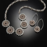 Eclipse Pendant and Flower Earrings by Jennifer Brower