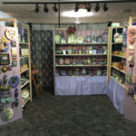 Booth displaying the work of ceramic artist Marsha Dowshen