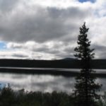 Overcast skies over a river