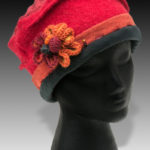 Red Beanie with flower stitched onto it