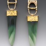 A set of green earrings with gold clasps by Caryn Hetherston