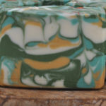 Teal, white, and orange marbled soaps from Bay Berry Bliss LLC