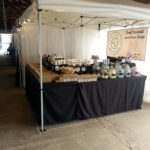 Booth showcasing the products of Bay Berry Bliss LLC