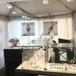Booth showcasing the jewelry of Yanina Siani